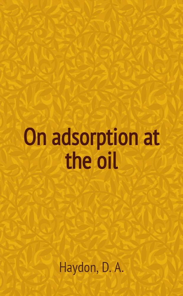 On adsorption at the oil/water interface and the calculation of electrical potentials in the aqueous surface phase