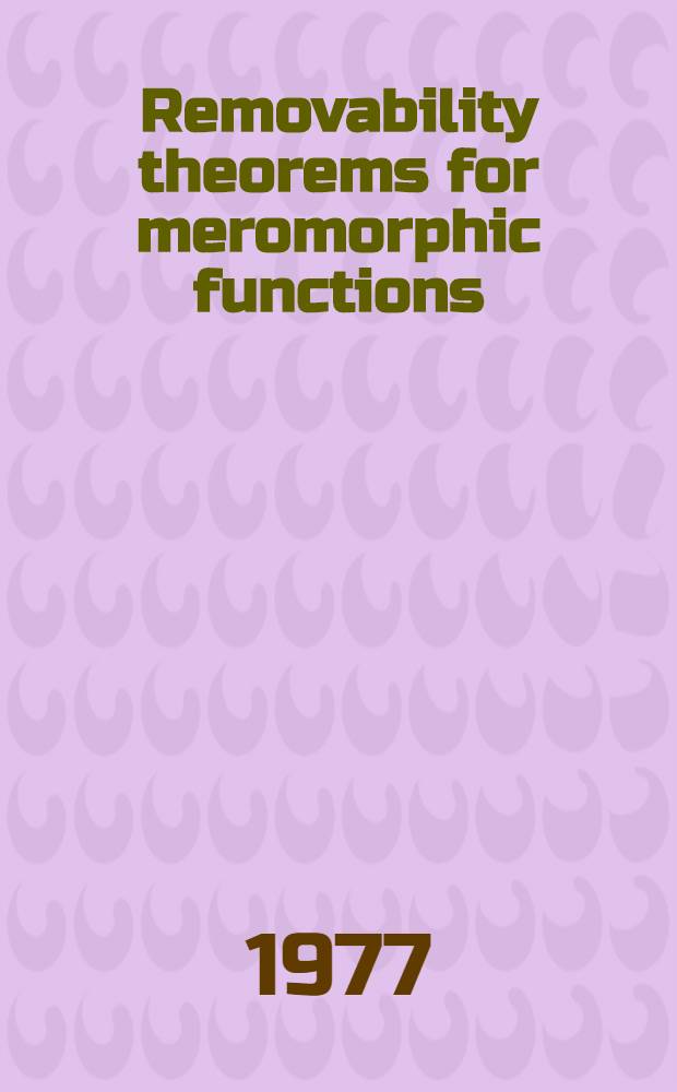 Removability theorems for meromorphic functions